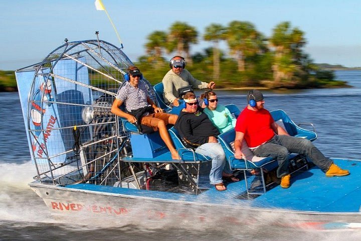 Homosassa airboat guests ride through Florida backwater with a captain at the helm.