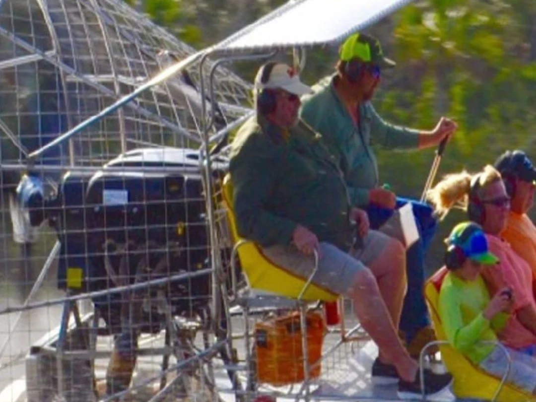 Homosassa airboat guests ride through Florida backwater with a captain at the helm.